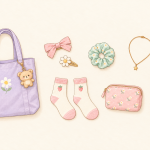 Pastel drawing of a tote with a bear charm, matching strawberry socks, hair accessories, jewelry, a pouch and a floral phone case.