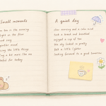 Open mint journal with short personal entries, a sleepy bear sticker, umbrella, flower, and small teacup note.
